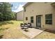 Cozy backyard with a patio setup, great for outdoor relaxation at 856 Donington Cir, Lawrenceville, GA 30045
