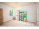 This bedroom features carpet floors, a window, and colorful storage shelves against the wall at 856 Donington Cir, Lawrenceville, GA 30045