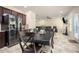 Open kitchen with stainless steel appliances and a large dining area with views to the living room at 856 Donington Cir, Lawrenceville, GA 30045