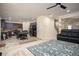 Expansive living space featuring a Gathering room, dining area, and modern kitchen with sleek, dark appliances at 856 Donington Cir, Lawrenceville, GA 30045