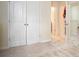 Neutral room featuring carpet floors, double doors, and white trim, providing a serene backdrop at 856 Donington Cir, Lawrenceville, GA 30045