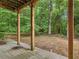 Back yard with a covered patio and lots of trees at 361 Brackin Trce, Grayson, GA 30017