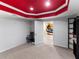 Finished basement room with motorcycle art and adjacent room view at 361 Brackin Trce, Grayson, GA 30017