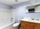 Updated bathroom features a new tub, commode, vanity, and a LED mirror at 361 Brackin Trce, Grayson, GA 30017
