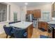 Bright kitchen with stainless steel appliances, light countertops, and a center island with seating at 361 Brackin Trce, Grayson, GA 30017