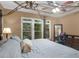 Bright bedroom featuring large windows, neutral walls and a comfortable four-poster bed at 361 Brackin Trce, Grayson, GA 30017