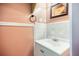Bathroom featuring a white sink, tile, and a mirror at 428 Cornish Mountain Rd, Oxford, GA 30054