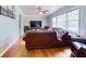 Living room features hardwood floors, a ceiling fan, and a large window, enhancing the inviting atmosphere at 428 Cornish Mountain Rd, Oxford, GA 30054
