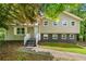 Charming two-story home with tan siding and a welcoming front entrance at 115 S Meadowcliff Cir, Carrollton, GA 30116