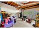 Garage space filled with storage, tools, and recreational items at 115 S Meadowcliff Cir, Carrollton, GA 30116
