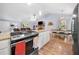 White kitchen cabinets with a stainless dishwasher and microwave at 115 S Meadowcliff Cir, Carrollton, GA 30116