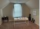 Converted attic space with a desk, neutral walls and carpet at 1291 Long Acre Dr, Loganville, GA 30052