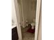Standard bathroom featuring a toilet, patterned shower curtain, and neutral wall colors at 1291 Long Acre Dr, Loganville, GA 30052