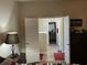 Open doorway offering a glimpse into the home's interior, bright bedroom and hallway at 1291 Long Acre Dr, Loganville, GA 30052