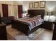 Comfortable main bedroom with a stylish bed, nightstands, and tasteful decorations at 1291 Long Acre Dr, Loganville, GA 30052