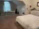 Bedroom with carpet and neutral walls, showcasing a desk, dresser and decorations at 1291 Long Acre Dr, Loganville, GA 30052