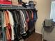 Organized walk-in closet with clothes racks and a dresser for storage at 1291 Long Acre Dr, Loganville, GA 30052