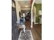 A well staged entryway leads to a living room area with plenty of natural light at 1291 Long Acre Dr, Loganville, GA 30052