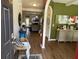 Inviting foyer with hardwood floors and stylish decor that leads into the living space at 1291 Long Acre Dr, Loganville, GA 30052