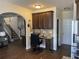 Open-concept kitchen with built in desk and stairs, perfect for modern living and entertaining at 1291 Long Acre Dr, Loganville, GA 30052