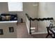 Upstairs landing area with a comfortable couch, perfect for relaxation at 1291 Long Acre Dr, Loganville, GA 30052