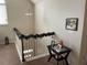 Upstairs landing area with festive garland, ready for the holidays at 1291 Long Acre Dr, Loganville, GA 30052