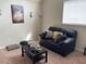 Cozy living room with plush sofa and neutral decor at 1291 Long Acre Dr, Loganville, GA 30052