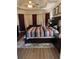 The main bedroom has a large bed with drawer storage at 1291 Long Acre Dr, Loganville, GA 30052