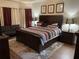 Relaxing main bedroom featuring a plush bed, matching nightstands, and soft lighting at 1291 Long Acre Dr, Loganville, GA 30052