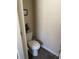 Clean powder room with a toilet and neutral-colored walls at 1291 Long Acre Dr, Loganville, GA 30052