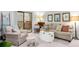 Comfortable living room with a cozy armchair, neutral colors, and access to the balcony at 2707 Cumberland Se Ct, Smyrna, GA 30080