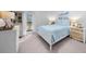 Serene bedroom featuring a white bed frame, soft bedding, and natural light at 2707 Cumberland Se Ct, Smyrna, GA 30080