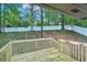 Wood deck overlooks the backyard and mature trees at 4787 Burford Nw Ct, Acworth, GA 30102