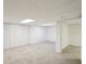 Basement featuring carpet, white walls, and multiple closets at 4787 Burford Nw Ct, Acworth, GA 30102