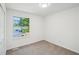 Bedroom featuring a window with a view of the outdoors at 4787 Burford Nw Ct, Acworth, GA 30102