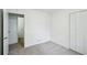 Bedroom featuring a closet with white bi-fold doors at 4787 Burford Nw Ct, Acworth, GA 30102