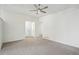 Spacious, neutral living room with a welcoming entrance and ample natural light at 4787 Burford Nw Ct, Acworth, GA 30102