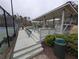A covered patio featuring seating and landscaping near the community playground at 5659 Brookstone Nw Dr, Acworth, GA 30101