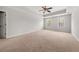 Spacious main bedroom with trey ceiling, carpeted floor, and neutral paint color at 5659 Brookstone Nw Dr, Acworth, GA 30101