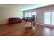 Open living room with wood flooring and a door to the outside at 2059 Lanier Harbor Pt, Buford, GA 30518
