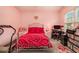 Bedroom with a decorative silver metal bed frame, desk area and carpeting at 3979 White Owl Nw Ct, Duluth, GA 30097