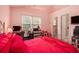 Bedroom featuring a large window, desk area and view of attached bathroom at 3979 White Owl Nw Ct, Duluth, GA 30097