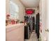 Walk-in closet featuring shelving, rod for hanging clothes and storage at 3979 White Owl Nw Ct, Duluth, GA 30097