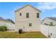 Exterior back of the home showing the siding, windows and backyard at 3979 White Owl Nw Ct, Duluth, GA 30097
