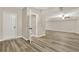Finished basement with wood plank flooring, recessed lighting, and flexible space for recreation or entertaining at 6218 Old Stilesboro Nw Rd, Acworth, GA 30101