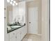 Bathroom featuring a white vanity, green counters, and plenty of storage at 6218 Old Stilesboro Nw Rd, Acworth, GA 30101