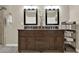 Chic bathroom featuring double vanity, framed mirrors, great storage, and tiled walk-in shower at 6218 Old Stilesboro Nw Rd, Acworth, GA 30101