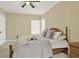 Bedroom with plush carpet, ceiling fan, and plenty of natural light at 6218 Old Stilesboro Nw Rd, Acworth, GA 30101