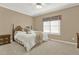 Cozy bedroom with plush carpet, ceiling fan, and plenty of natural light at 6218 Old Stilesboro Nw Rd, Acworth, GA 30101