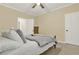 Bedroom with plush carpet, ceiling fan, and plenty of natural light at 6218 Old Stilesboro Nw Rd, Acworth, GA 30101